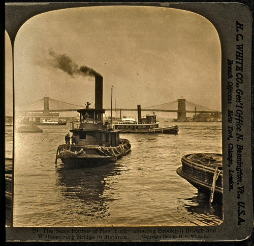 The busy harbour of New York - showing Brooklyn Bridge and Williamsburg Bridge in distance, 1905.