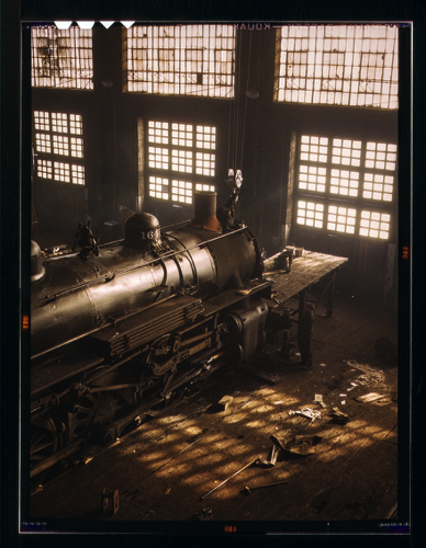 C & NW RR. Working on a locomotive at the 40th Street railroad shops, Chicago, Ill. 1942. (From Kodachrome 4x5”)